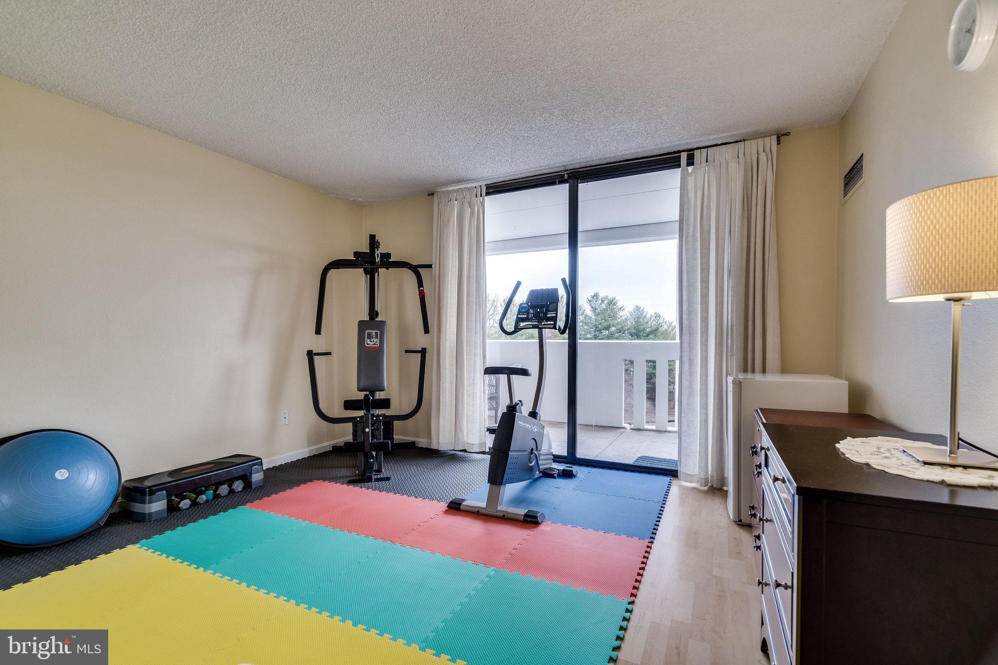 6101 Edsall Road, Unit 905 Alexandria, VA 22304 - Photo 34 of 62 a view of a room with gym equipment