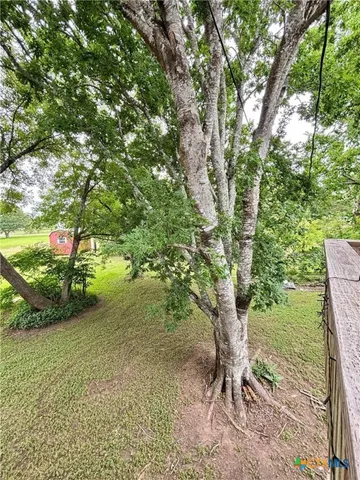 a view of a balcony with chairs