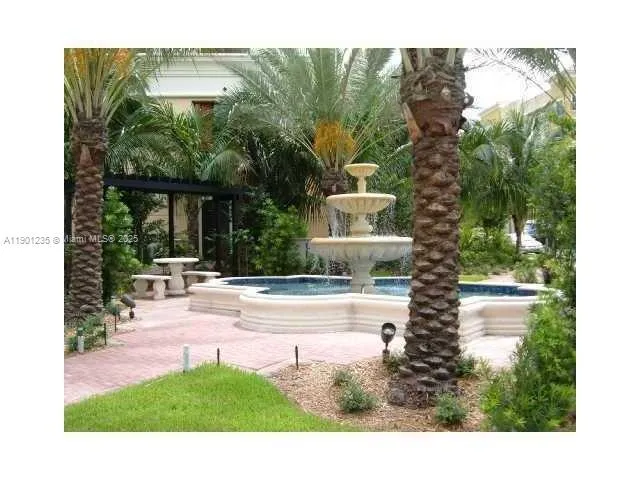 a view of a house with backyard porch and garden
