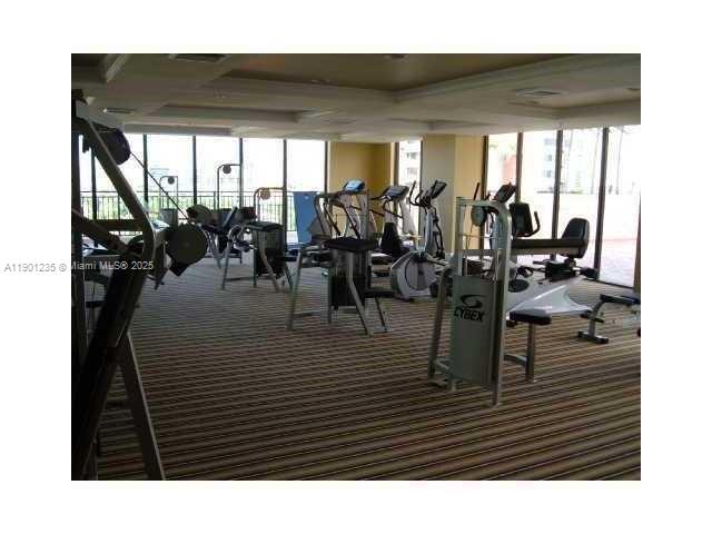 888 Douglas Road, Unit 601 Miami, FL 33134 - Photo 6 of 11 a living room with furniture