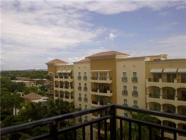 888 Douglas Road, Unit 601 Miami, FL 33134 - Photo 10 of 11 a view of a building from a balcony