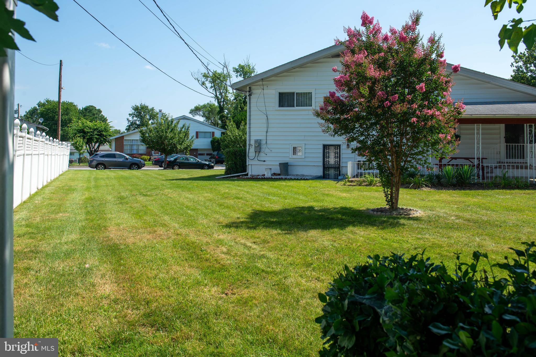 7408 Shirley Road Baltimore, MD 21207 - Photo 19 of 25 a house with garden in front of it