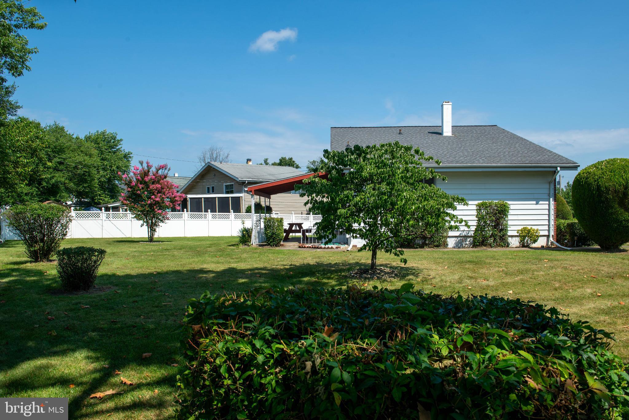 7408 Shirley Road Baltimore, MD 21207 - Photo 20 of 25 a view of a house with a yard