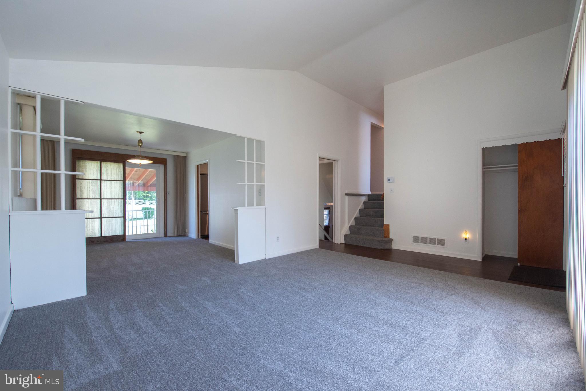 7408 Shirley Road Baltimore, MD 21207 - Photo 6 of 25 a view of empty room with windows