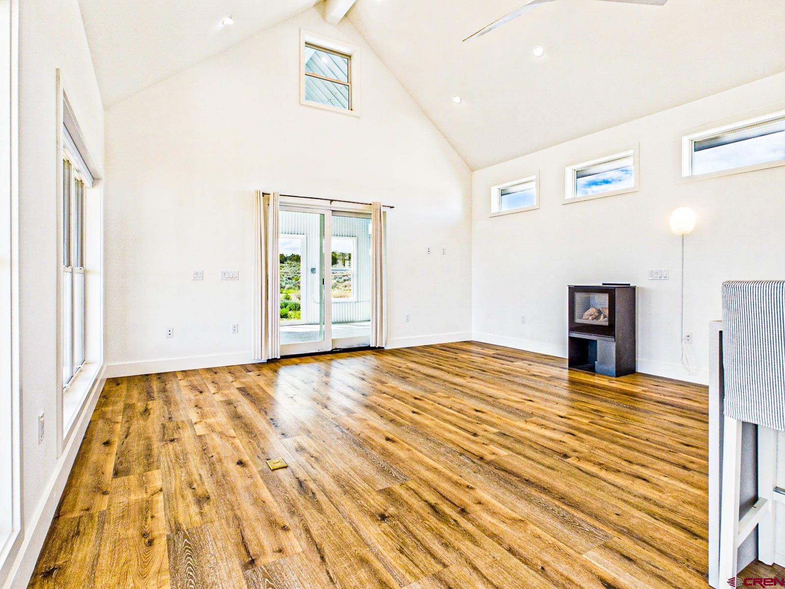 3530 Black Canyon Road Crawford, CO 81415 - Photo 12 of 45 a view of a livingroom with wooden floor