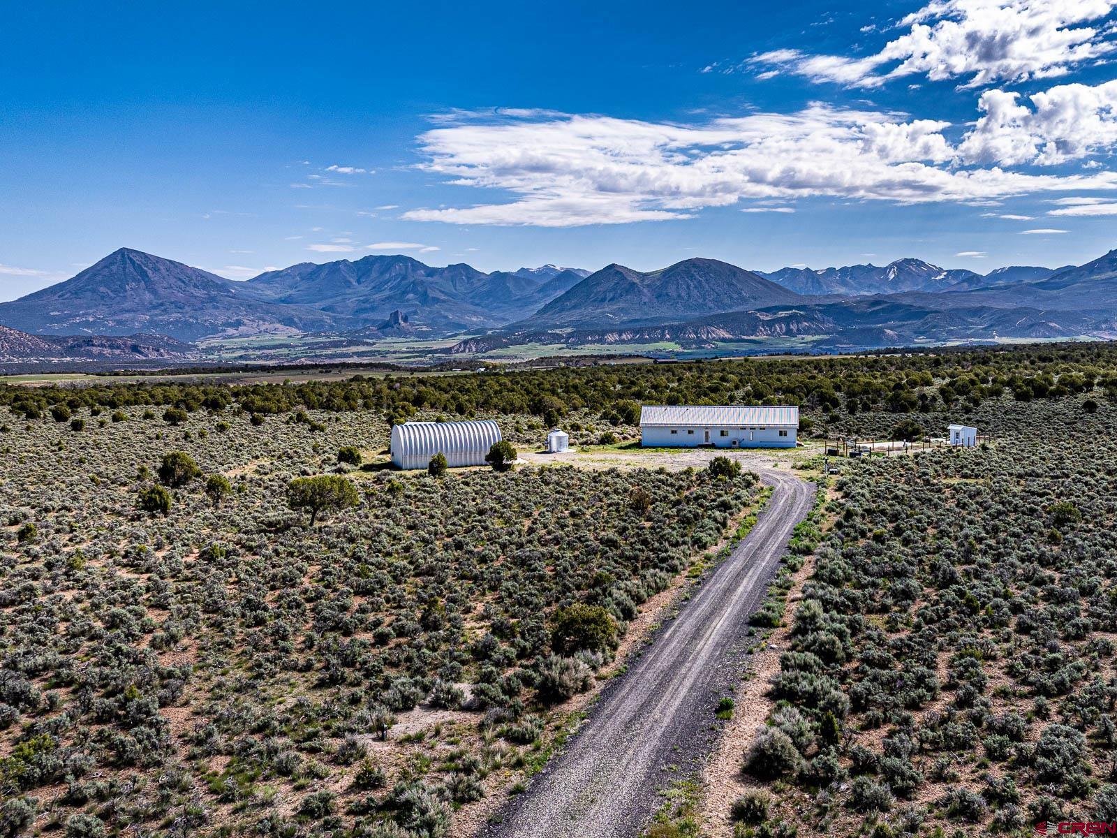 3530 Black Canyon Road Crawford, CO 81415 - Photo 2 of 45 a view of a city with a lake