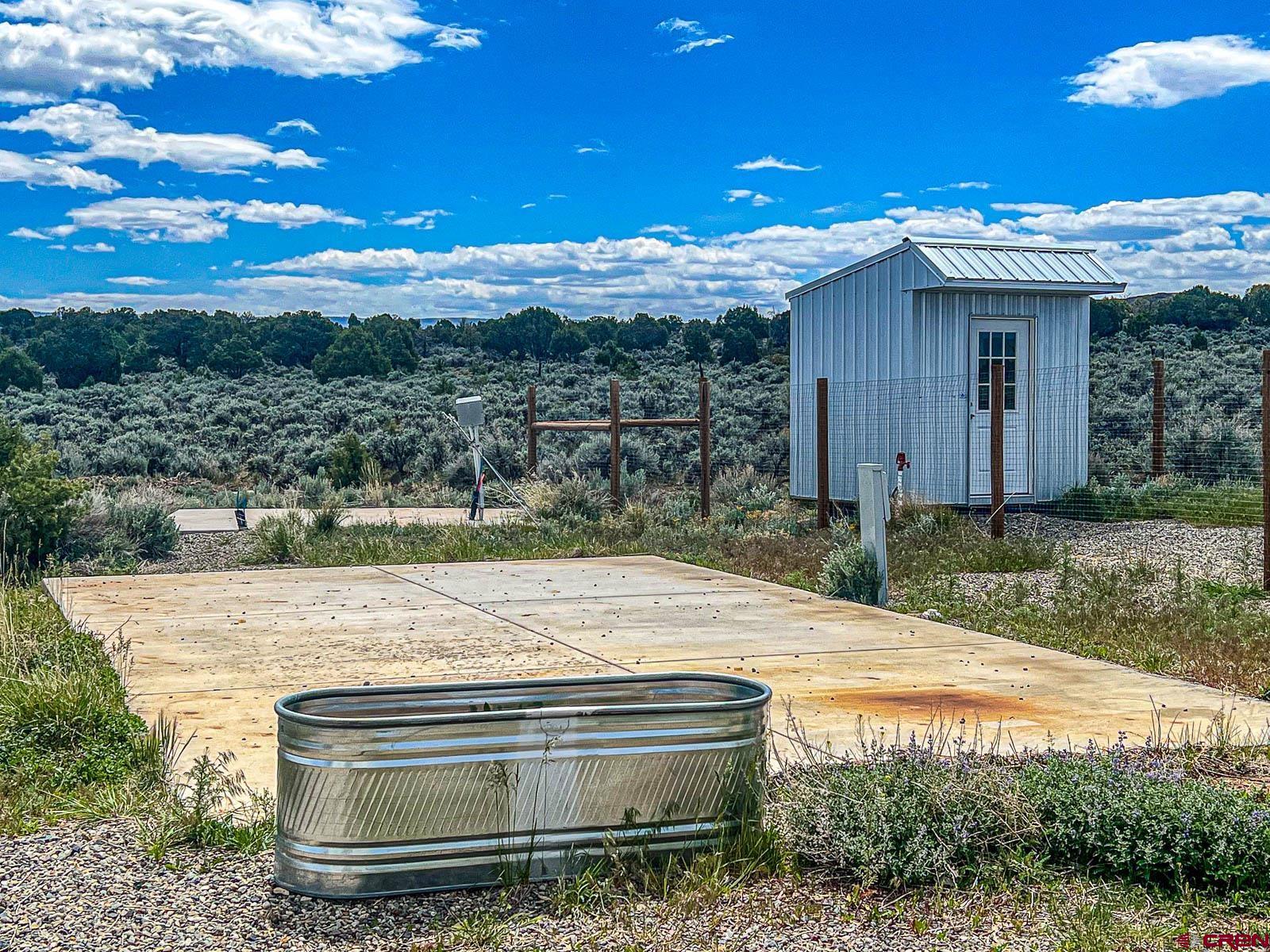3530 Black Canyon Road Crawford, CO 81415 - Photo 39 of 45 a view of house with yard