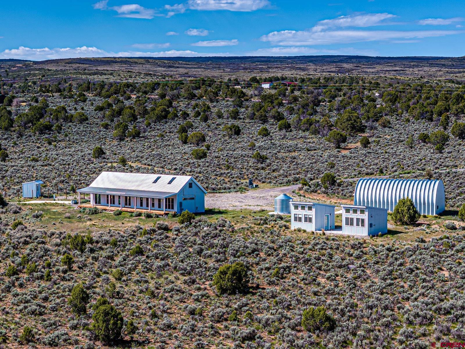 3530 Black Canyon Road Crawford, CO 81415 - Photo 4 of 45 a view of roof with city view