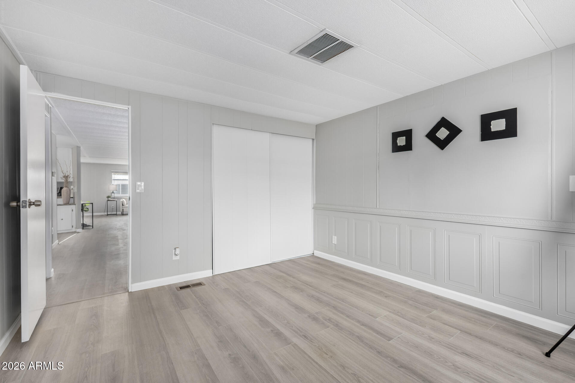 3104 East Broadway Road, Unit 30 Mesa, AZ 85204 - Photo 15 of 28 a view of a livingroom with wooden floor
