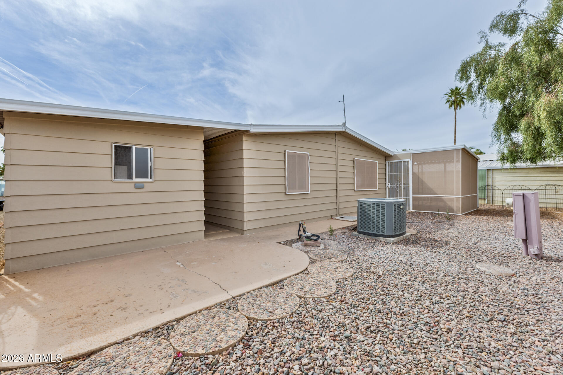 3104 East Broadway Road, Unit 30 Mesa, AZ 85204 - Photo 26 of 28 a view of a back yard of the house