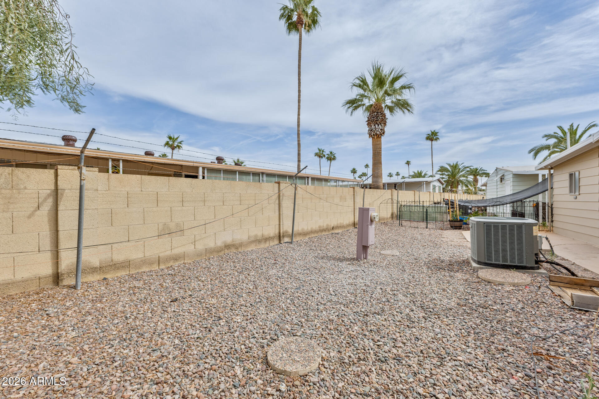 3104 East Broadway Road, Unit 30 Mesa, AZ 85204 - Photo 28 of 28 a view of potted plants with sky view