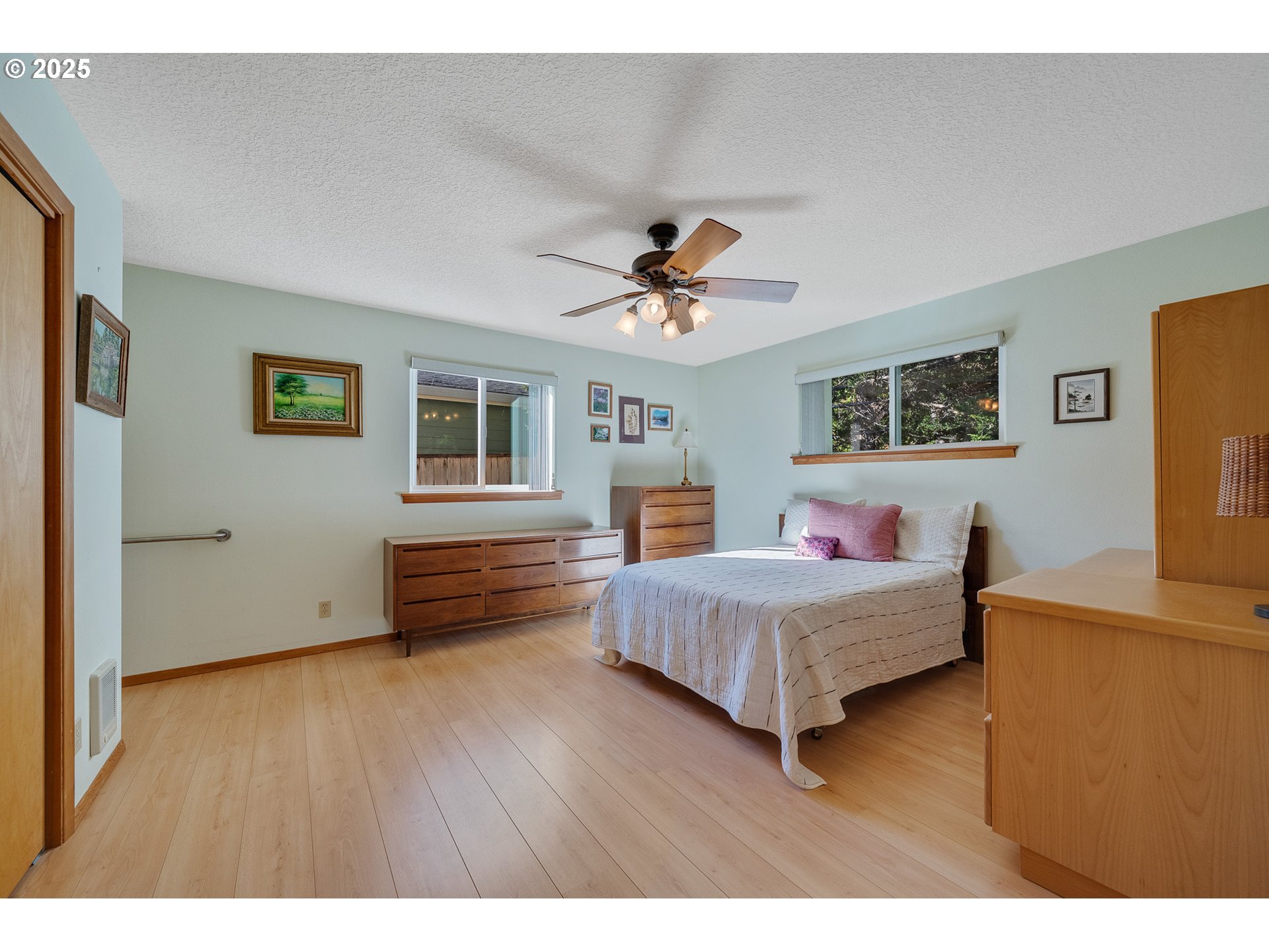 10750 Neptune Way Nehalem, OR 97131 - Photo 12 of 25 a living room with furniture and a wooden floor