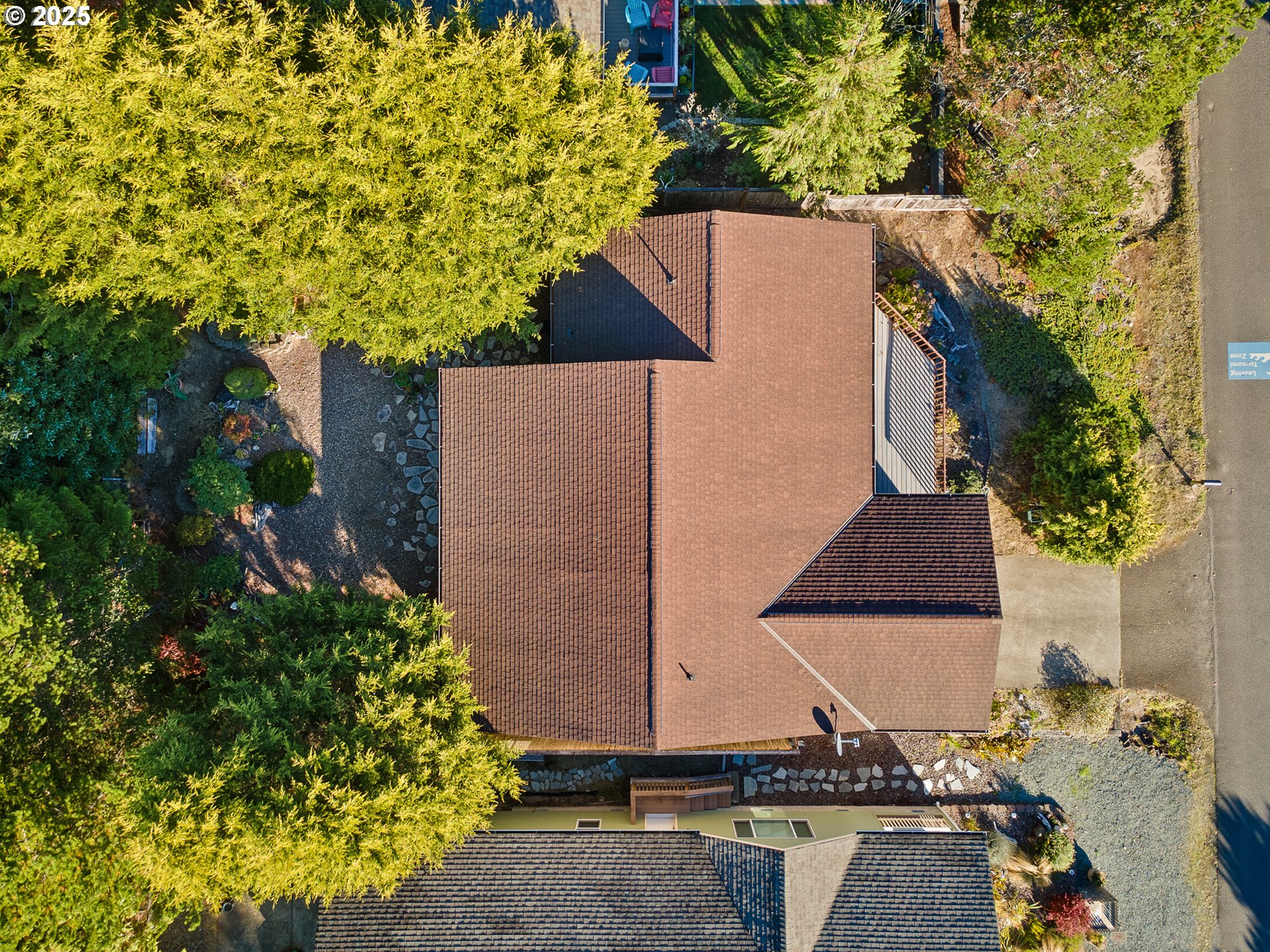 10750 Neptune Way Nehalem, OR 97131 - Photo 18 of 25 front view of a house with a yard