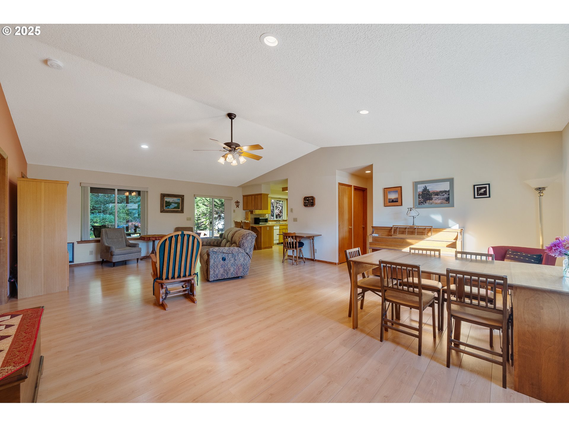 10750 Neptune Way Nehalem, OR 97131 - Photo 6 of 25 a living room with furniture and a wooden floor