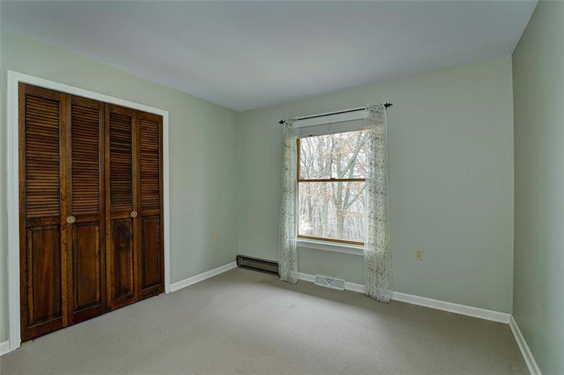 163 Glen Rape Road Rochester, PA 15074 - Photo 17 of 25 Bedroom 2 is a nice sized room with DBL Closet and a rear-facing window.