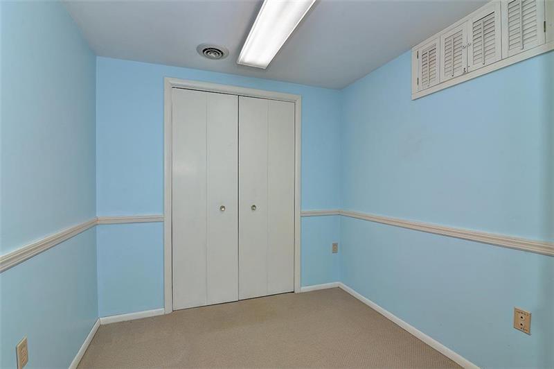 163 Glen Rape Road Rochester, PA 15074 - Photo 21 of 25 LOWER LEVEL Guest Room w/ closet perfect for overnight guest or a home office.