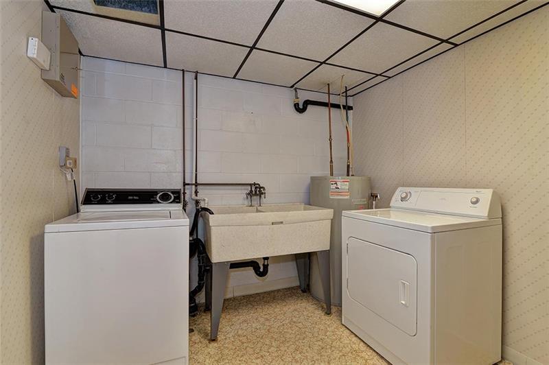 163 Glen Rape Road Rochester, PA 15074 - Photo 23 of 25 Full Size Laundry Room with DBL utility sink, Washer, Dryer and plenty of storage cabinetry (not shown in image).