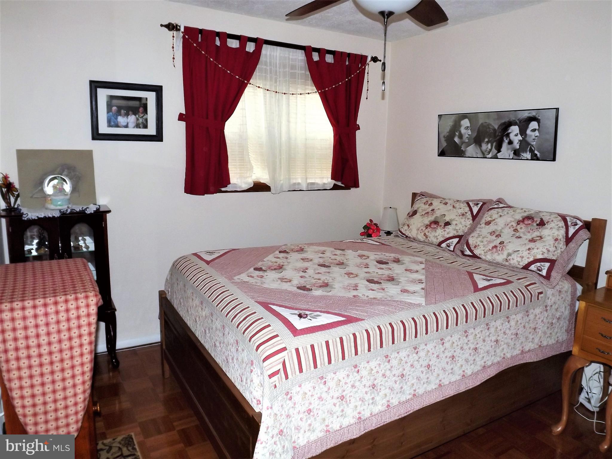 7357 Edsworth Road Baltimore, MD 21222 - Photo 26 of 30 2nd bedroom has hardwood floors.
