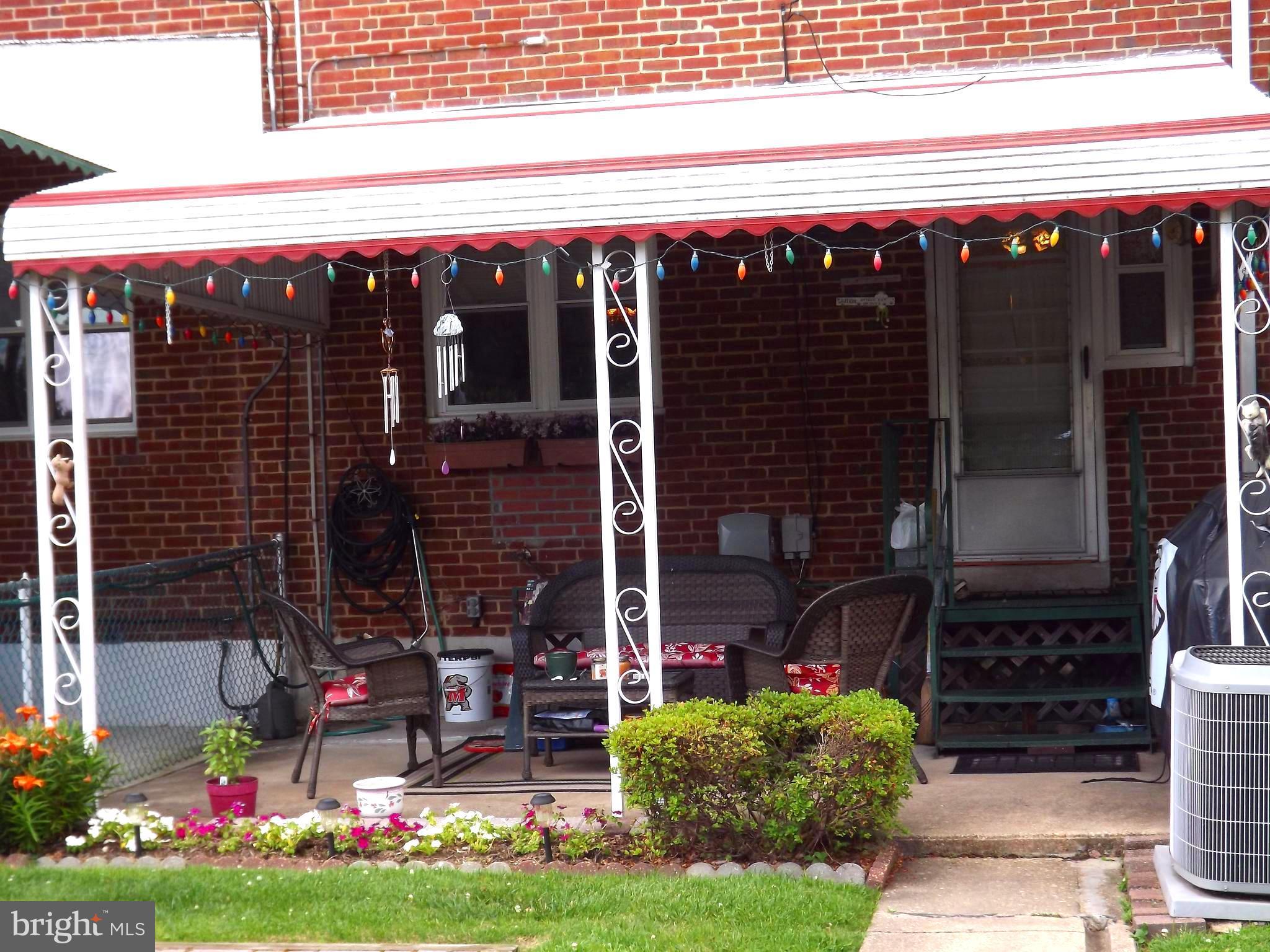 7357 Edsworth Road Baltimore, MD 21222 - Photo 5 of 30 Rear covered patio (furniture stays)