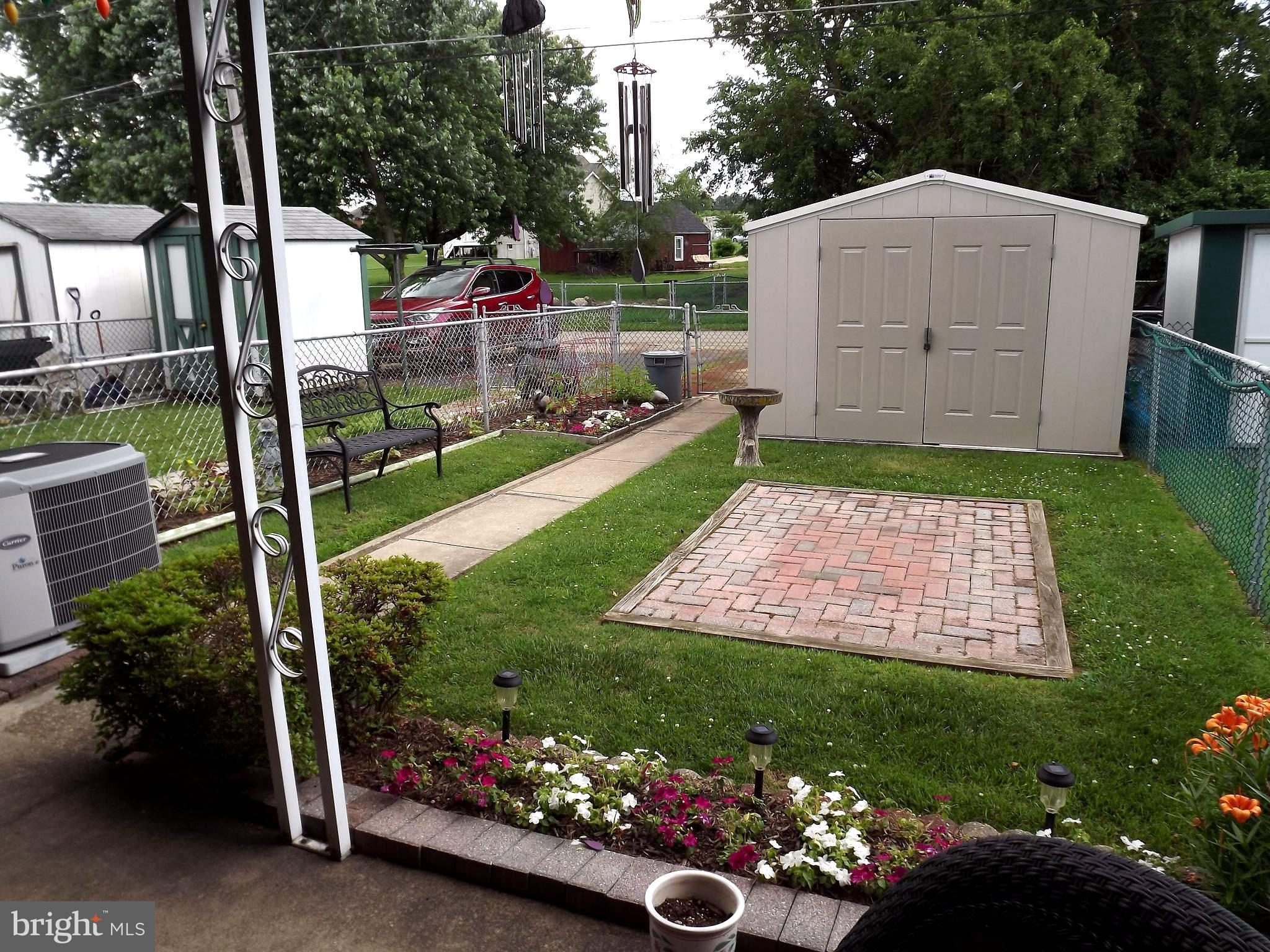 7357 Edsworth Road Baltimore, MD 21222 - Photo 6 of 30 Nice yard w/patio, shed & 2 car parking pad