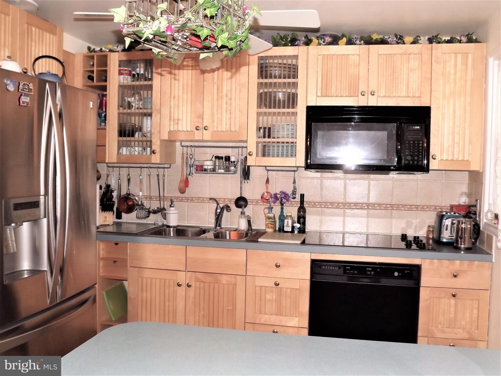 7357 Edsworth Road Baltimore, MD 21222 - Photo 7 of 30 Birch & Oak Cabinets.