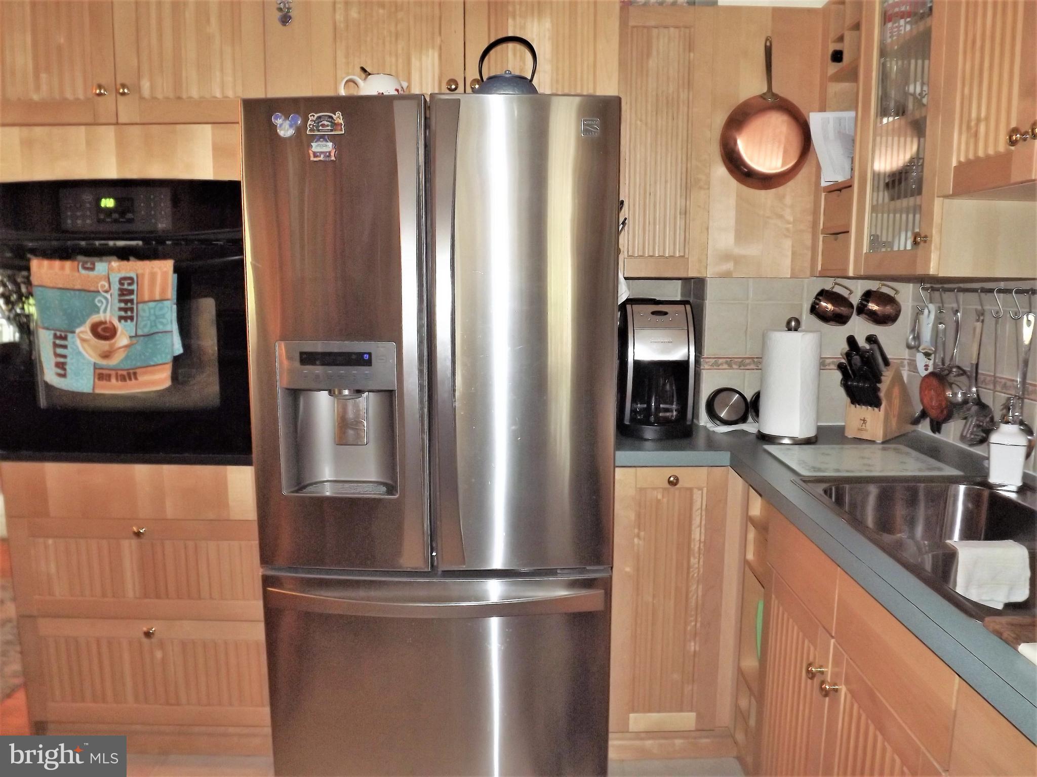 7357 Edsworth Road Baltimore, MD 21222 - Photo 9 of 30 SS Steel Refrigerator w/bottom freezer.