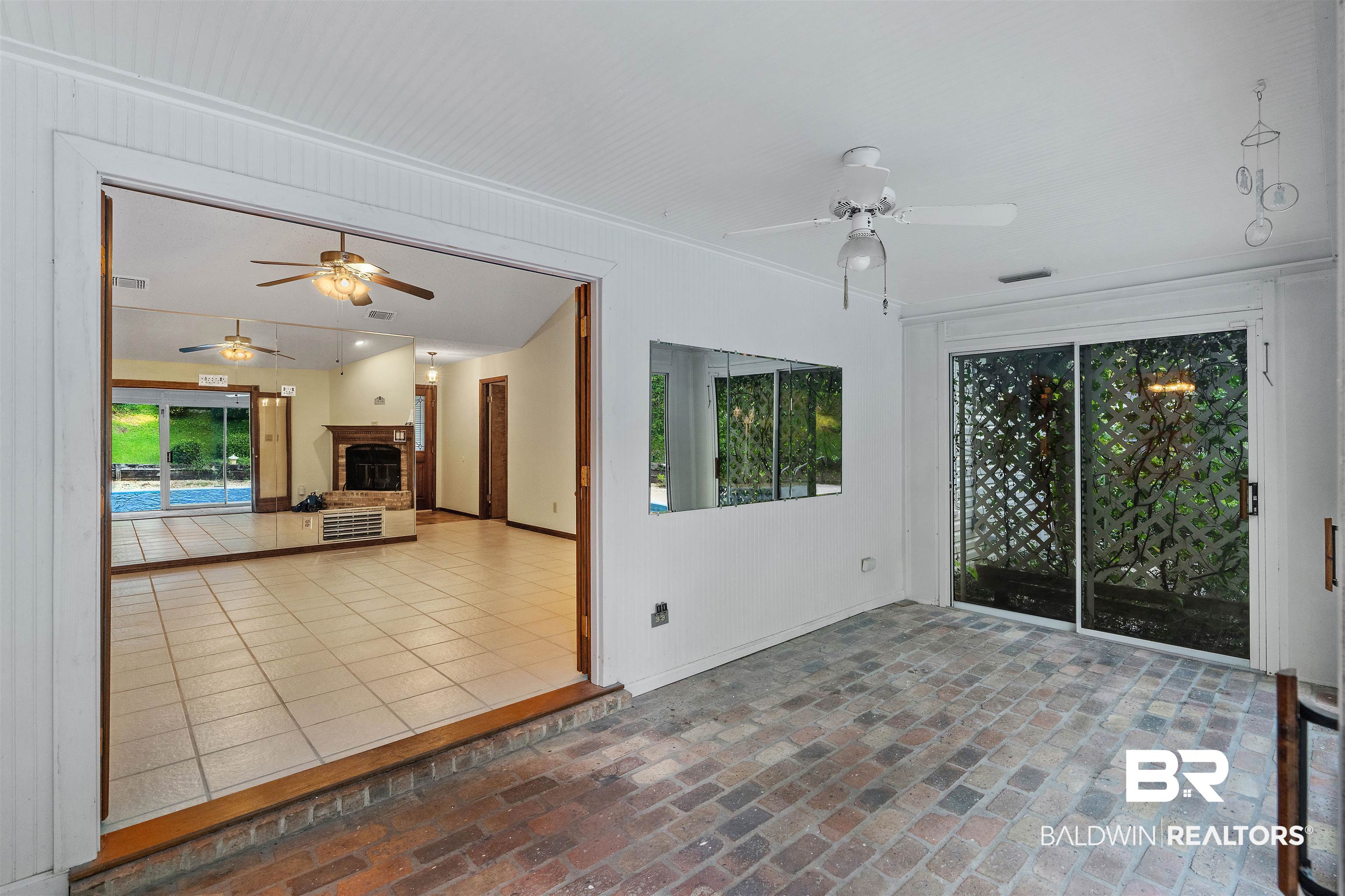 438 Ridgewood Drive Daphne, AL 36526 - Photo 9 of 28 Empty room featuring ceiling fan