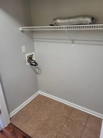 a view of a room with racks on the wall