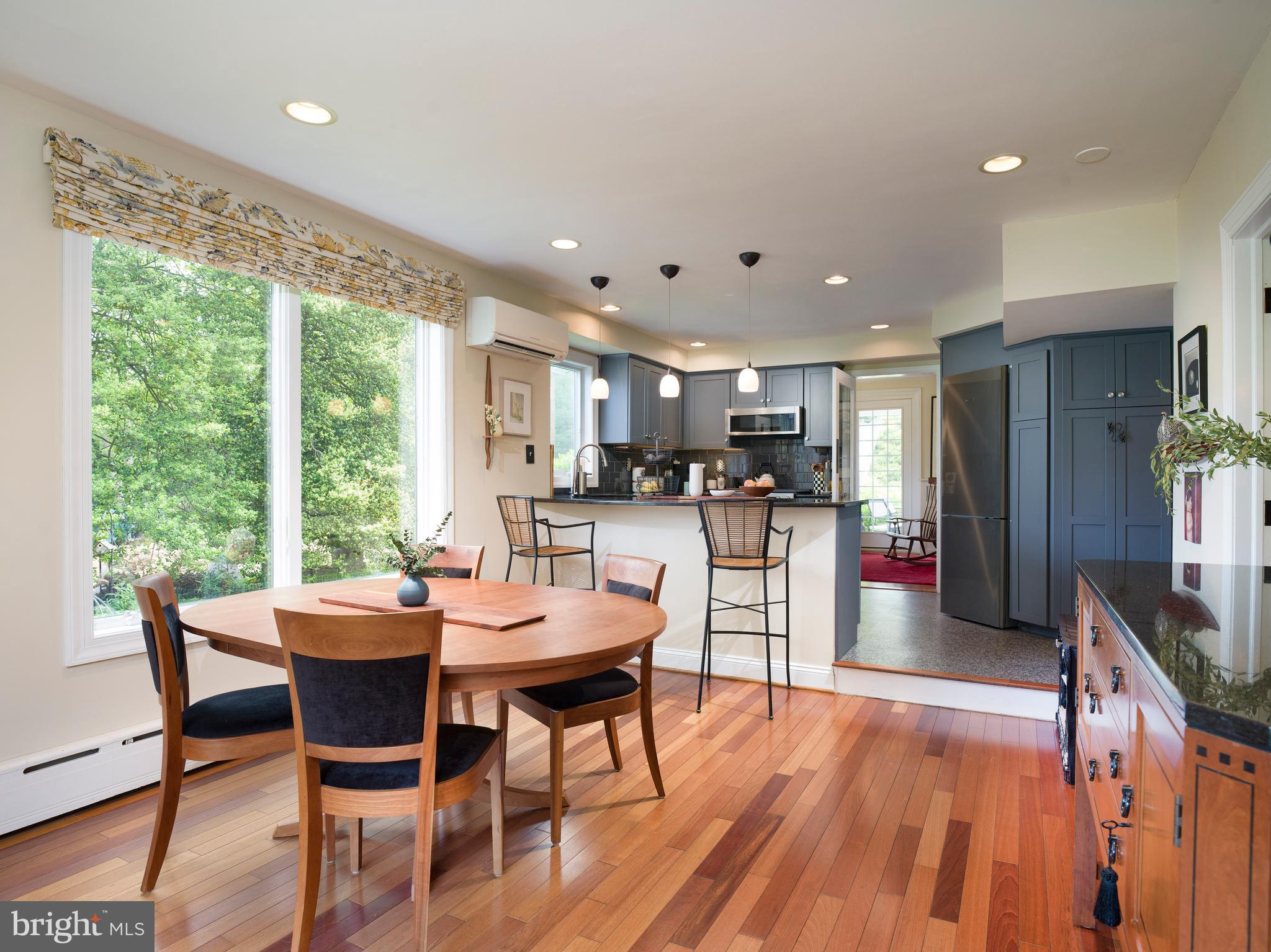 442 Old Eagle School Road Wayne, PA 19087 - Photo 15 of 39 a view of a dining room with furniture window and wooden floor