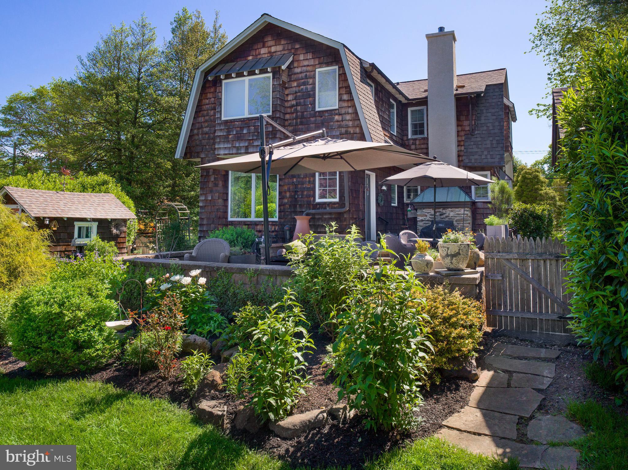 442 Old Eagle School Road Wayne, PA 19087 - Photo 32 of 39 a front view of a house with a yard and trees