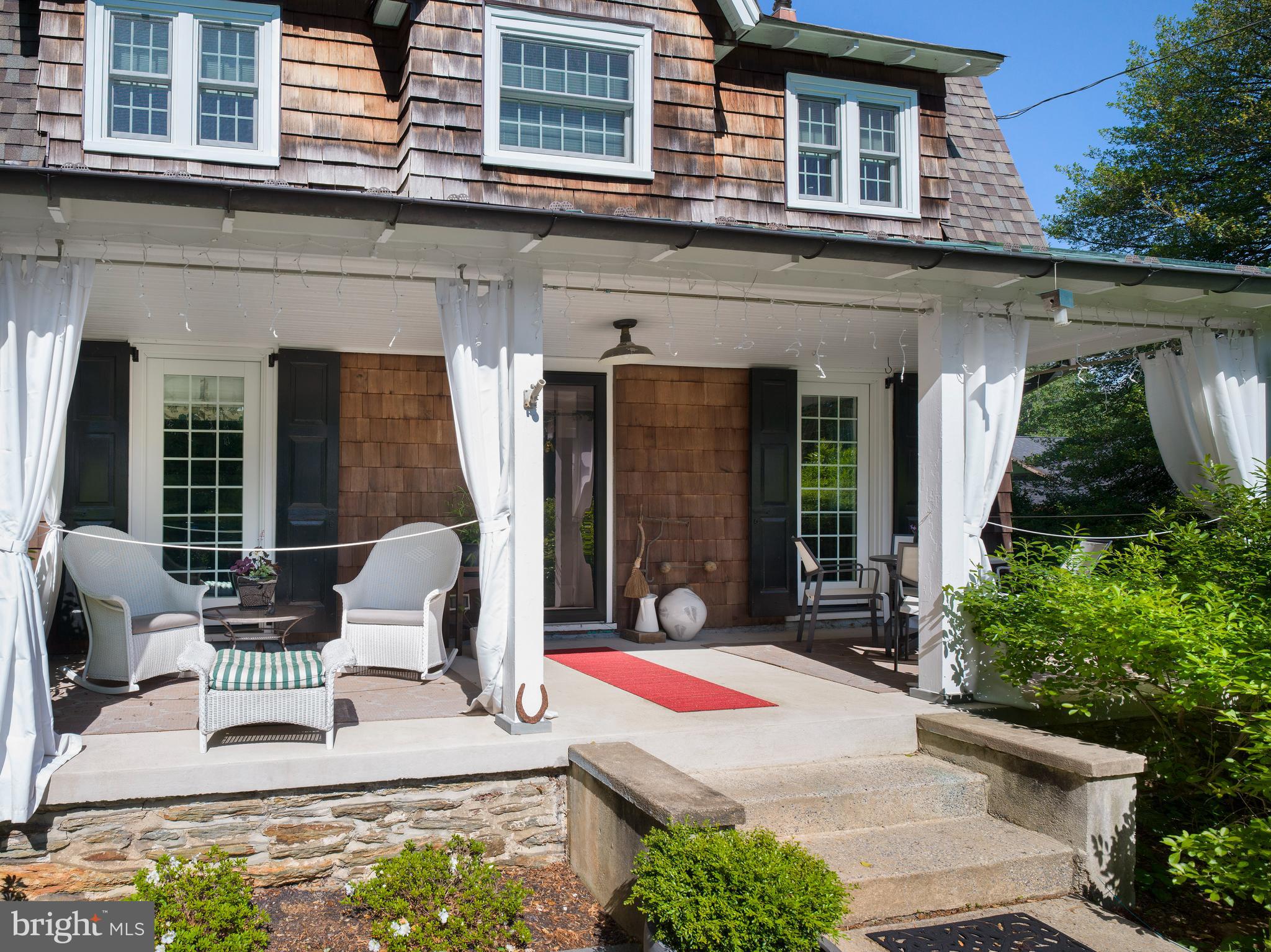 442 Old Eagle School Road Wayne, PA 19087 - Photo 4 of 39 a front view of a house with a porch