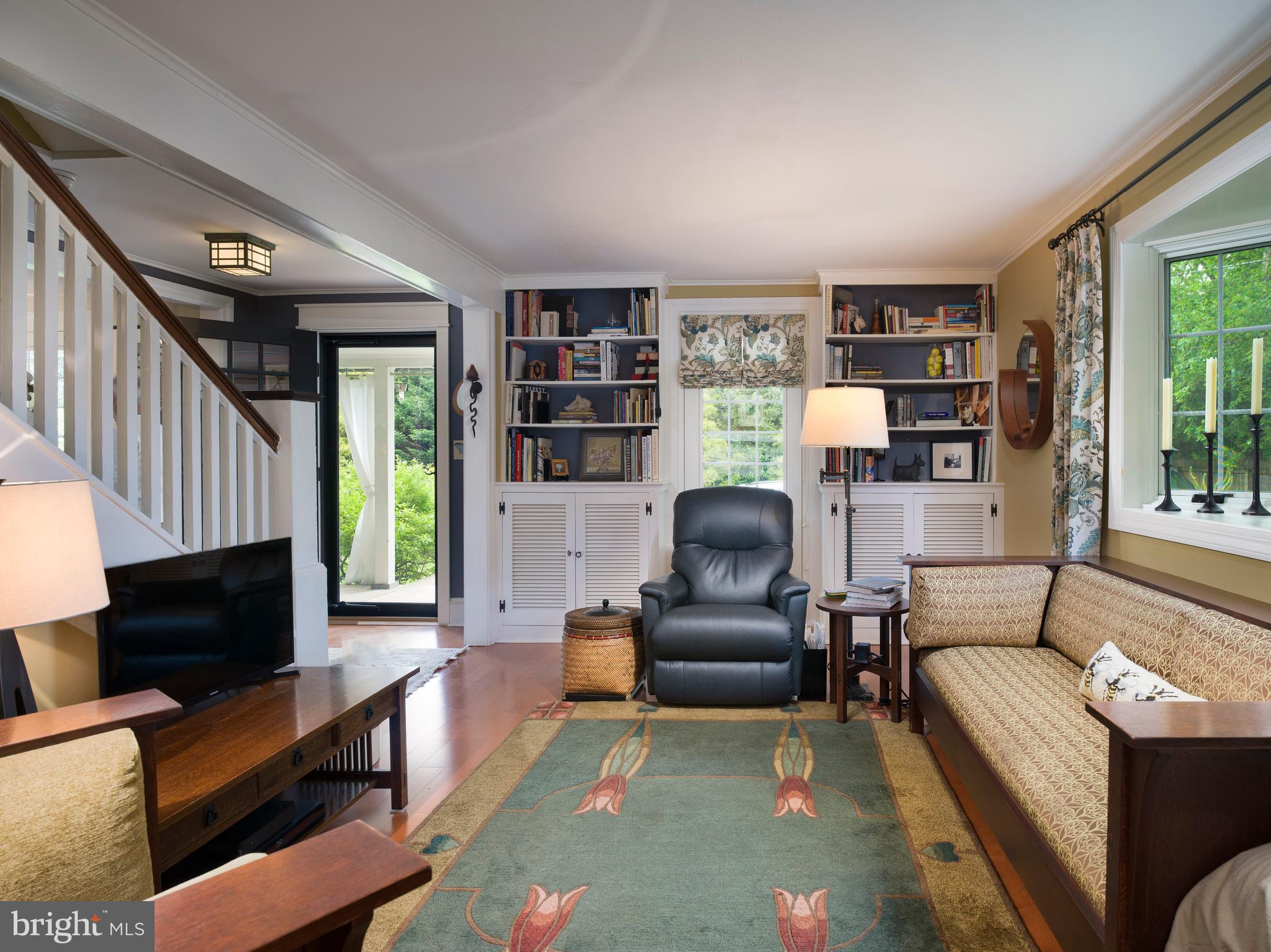 442 Old Eagle School Road Wayne, PA 19087 - Photo 9 of 39 a living room with furniture and a flat screen tv