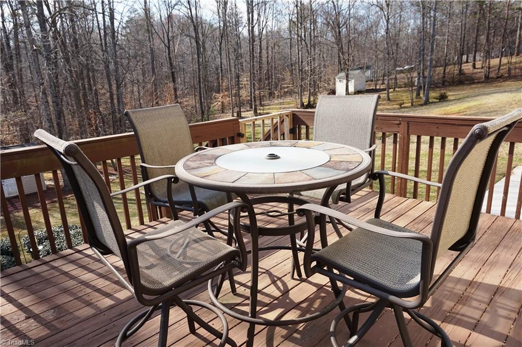 7517 Kristen Drive Oak Ridge, NC 27310 - Photo 30 of 30 Deck with retractable awning.