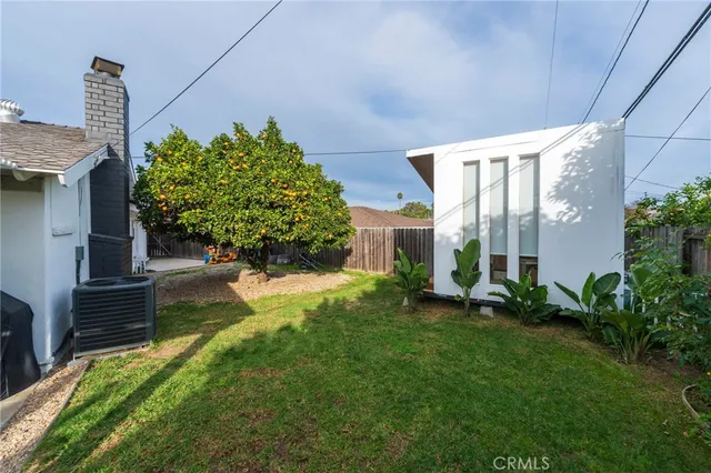 a living room with furniture and window