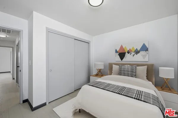 a front view of a house with yard and green space