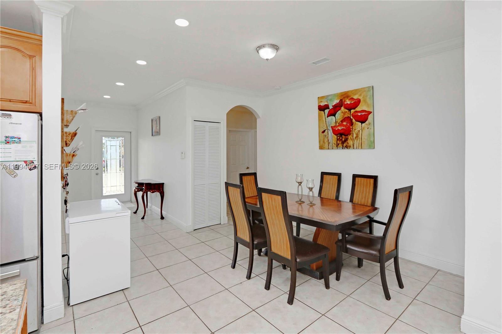 12245 Southwest 218th Street Miami, FL 33170 - Photo 12 of 32 a view of a dining room with furniture