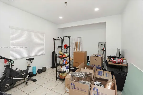 a view of a workspace with furniture