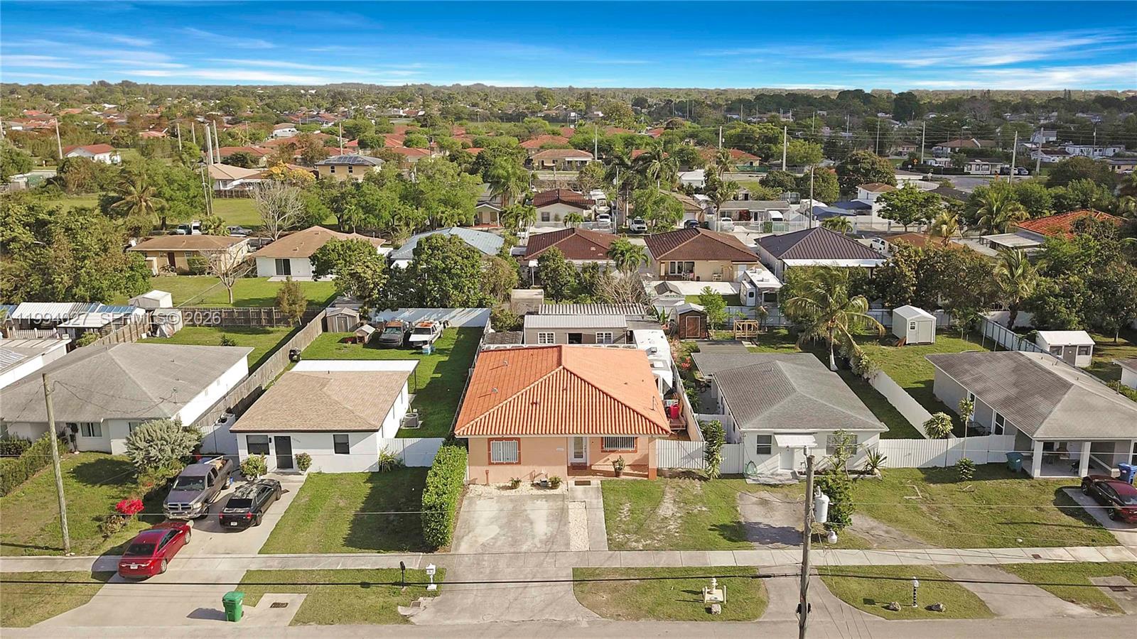12245 Southwest 218th Street Miami, FL 33170 - Photo 28 of 32 an aerial view of residential houses with outdoor space