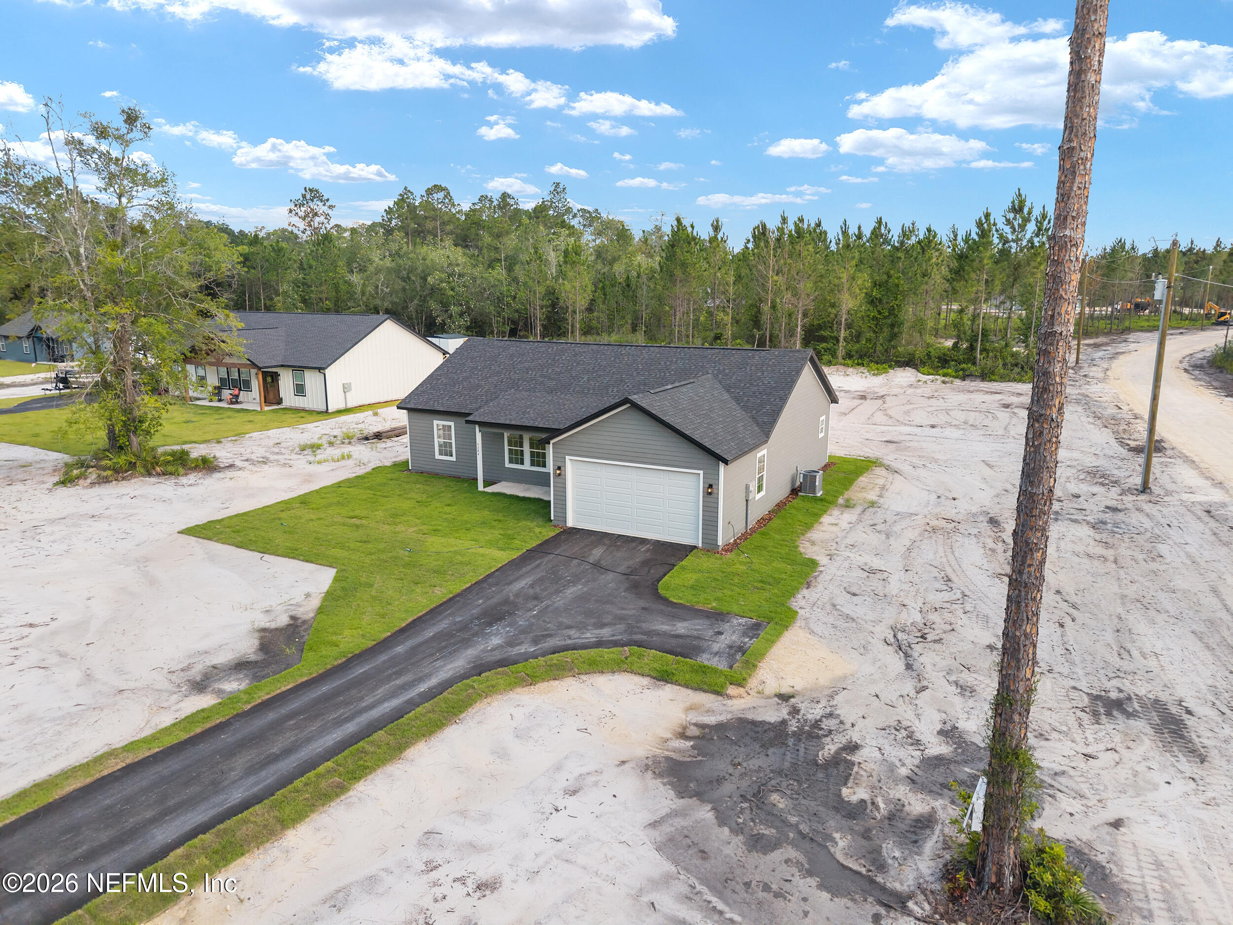 9284 Southwest Sw Cr Hampton, FL 32044 - Photo 38 of 48 DJI_20260625184257_0344_D