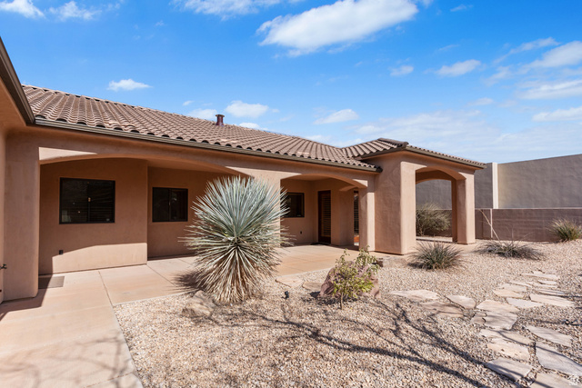 2464 East Granite Way St. George, UT 84790 - Photo 15 of 106 Rear view of property with stucco siding and a patio