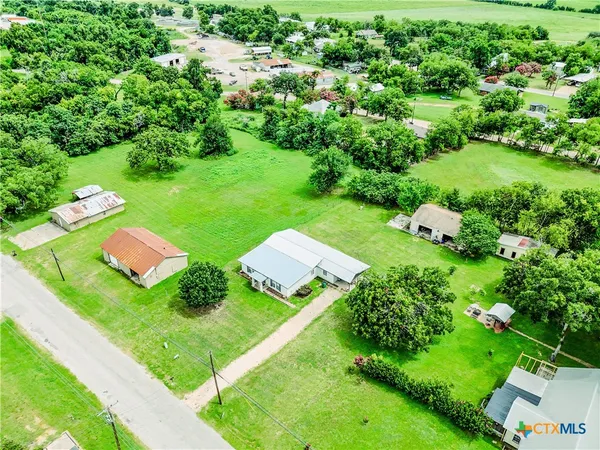 a view of garden with trees