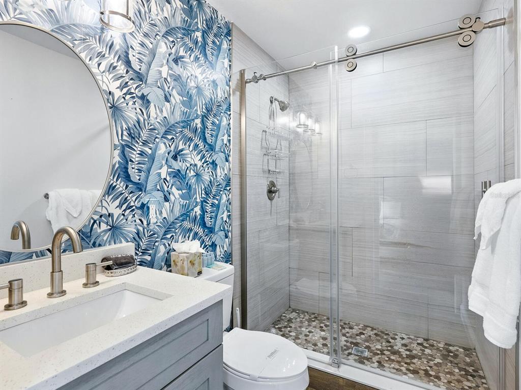 544 Canal Road Sarasota, FL 34242 - Photo 20 of 35 a bathroom with a sink toilet and shower