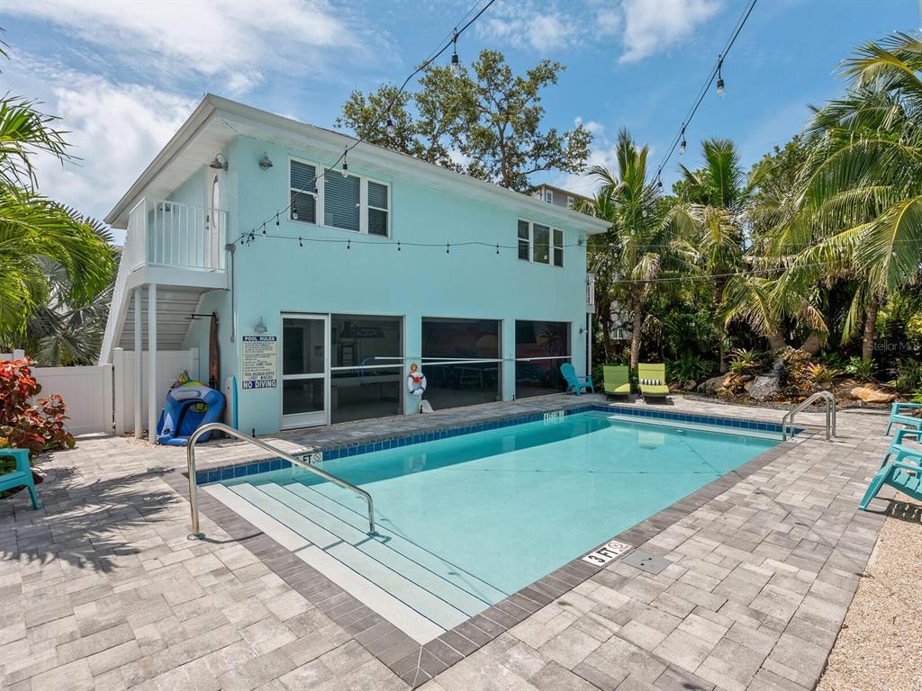 544 Canal Road Sarasota, FL 34242 - Photo 21 of 35 a front view of a house with garden