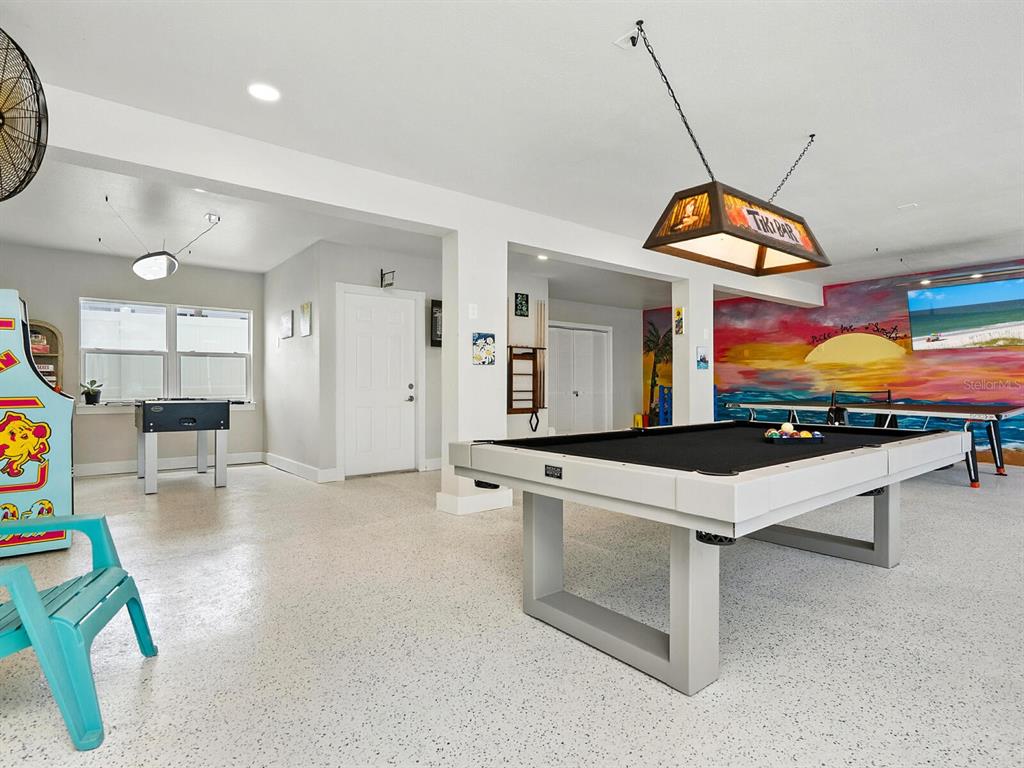 544 Canal Road Sarasota, FL 34242 - Photo 27 of 35 an open kitchen with a table and chairs