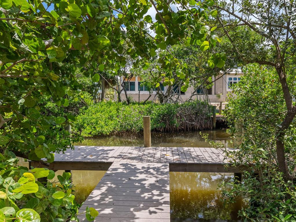 544 Canal Road Sarasota, FL 34242 - Photo 29 of 35 a view of a back yard of the house