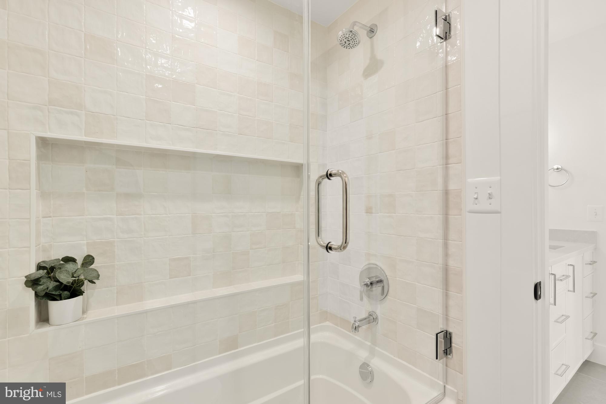 4427 Ridge Street Chevy Chase, MD 20815 - Photo 22 of 42 a bathroom with a bathtub