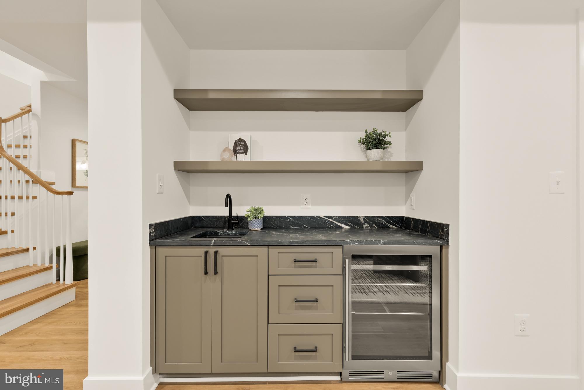 4427 Ridge Street Chevy Chase, MD 20815 - Photo 30 of 42 a kitchen with stainless steel appliances granite countertop a stove and a refrigerator