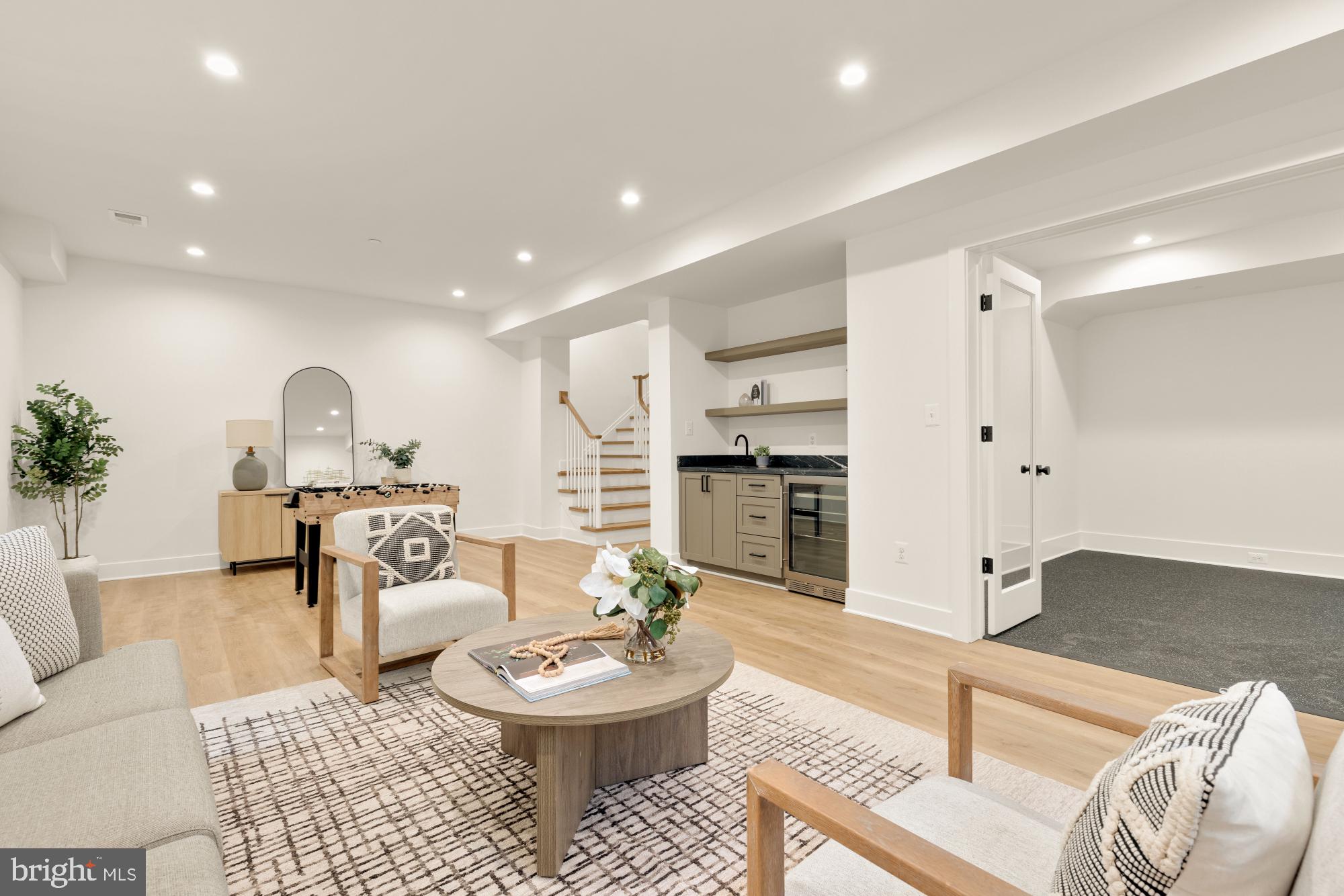 4427 Ridge Street Chevy Chase, MD 20815 - Photo 33 of 42 a living room with furniture and white walls