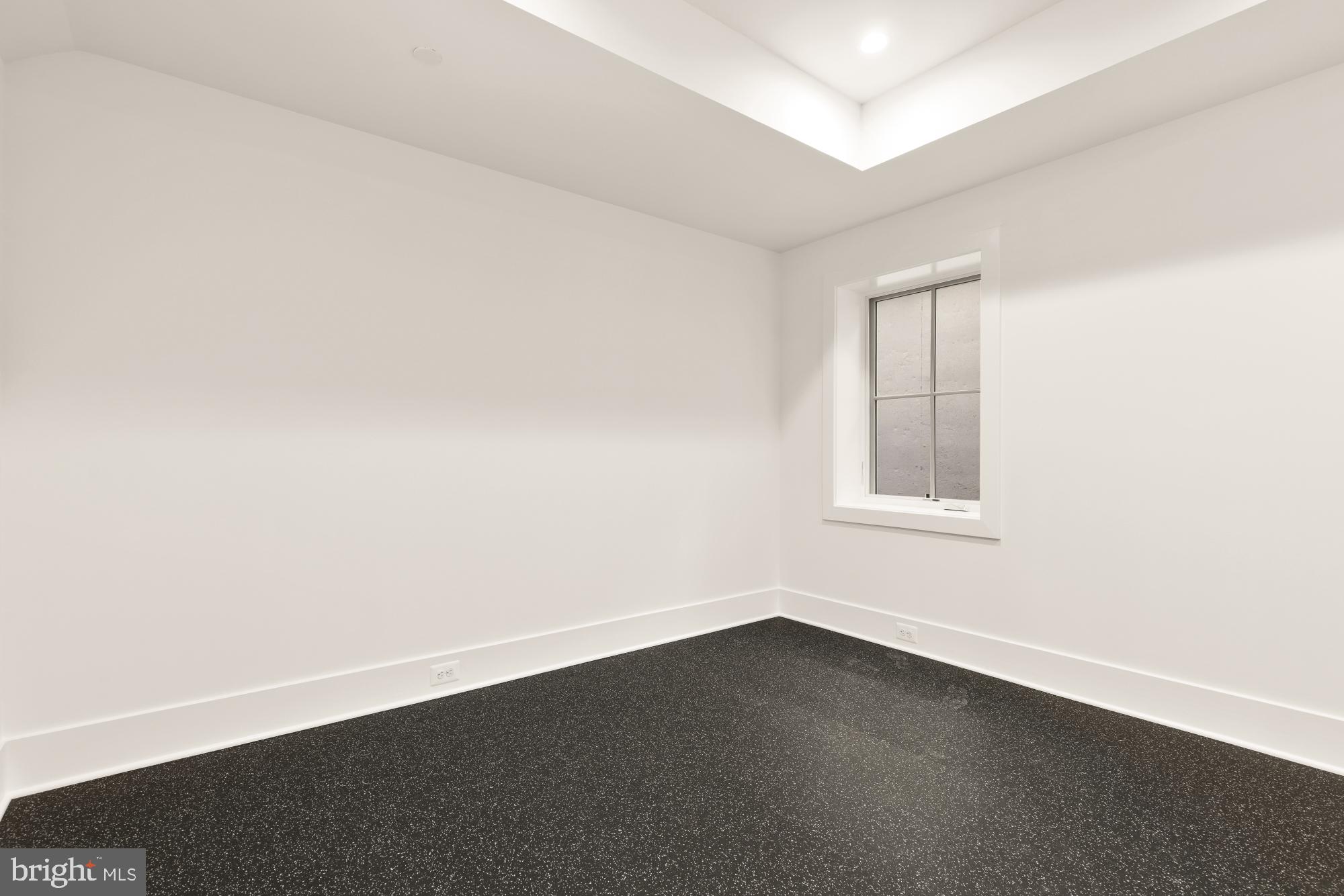 4427 Ridge Street Chevy Chase, MD 20815 - Photo 34 of 42 an empty room with a window