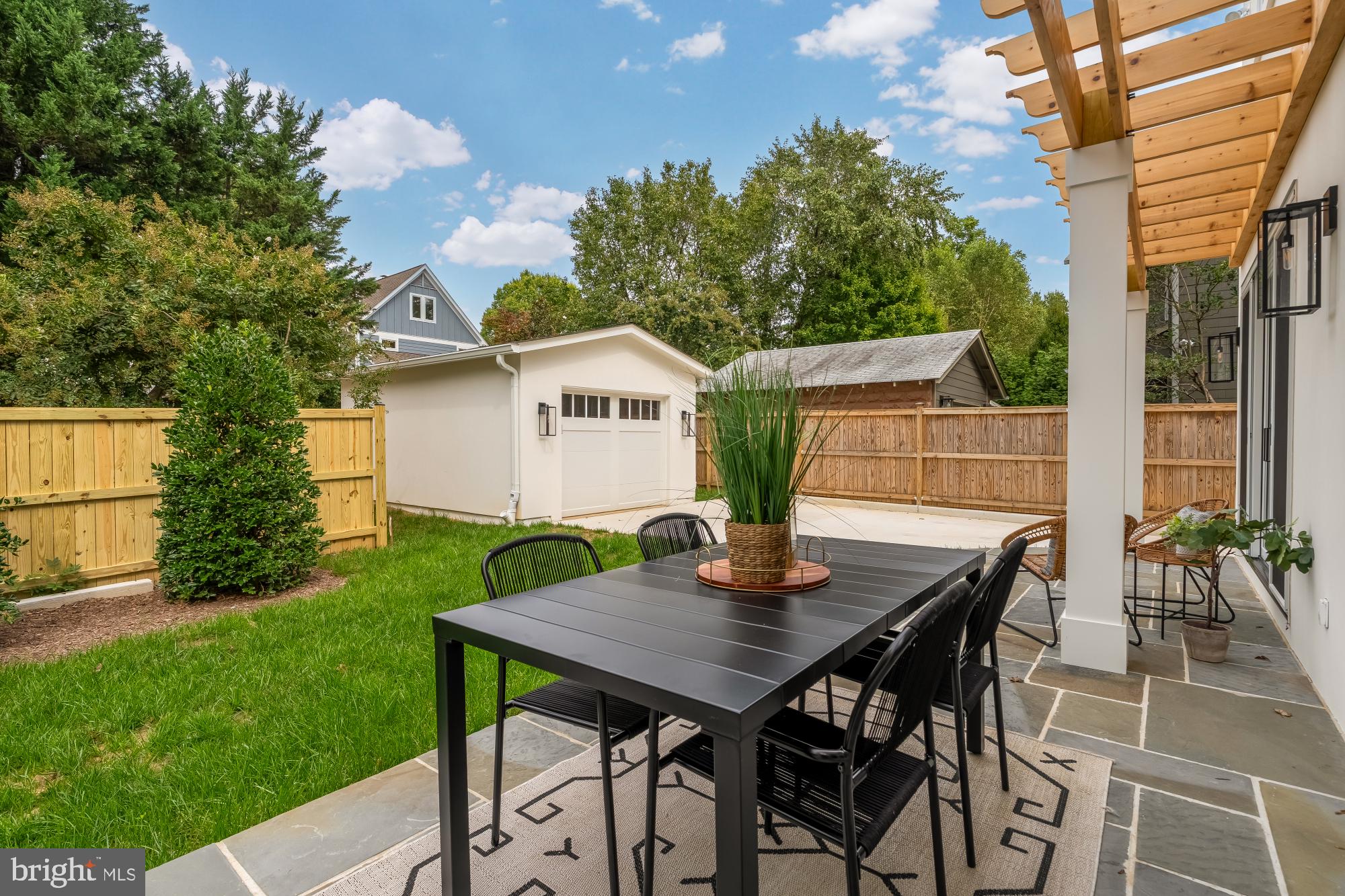 4427 Ridge Street Chevy Chase, MD 20815 - Photo 39 of 42 a view of an outdoor space with table and chair